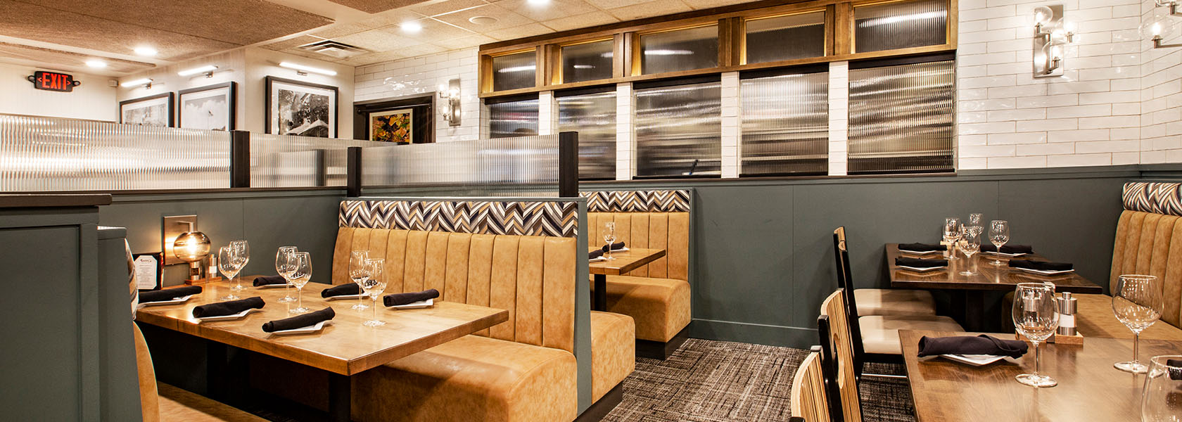 Booth and banquette seating in the upper dining room at Tucci's in Dublin, Ohio.