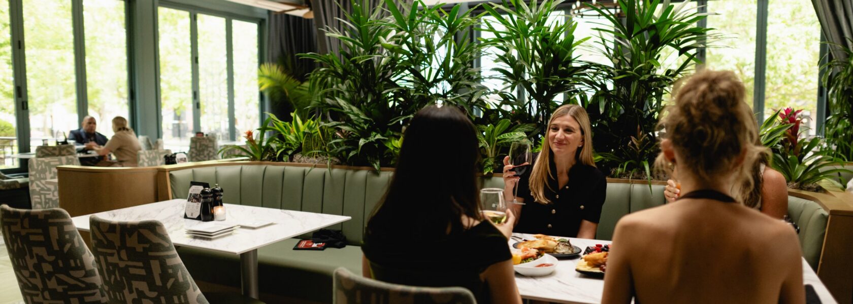 Guests in the dining room at Tucci's