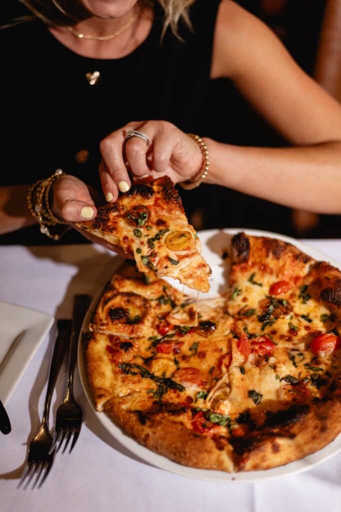 A slice of pizza at Tucci's